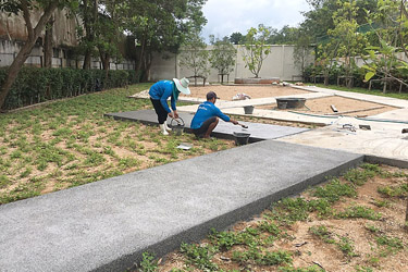 Completing the walk way with sandwash coat